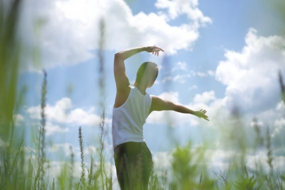 a man standing in a field
